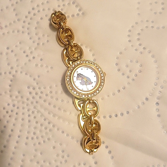 Disney Accessories - Disney Eeyore Gold tone bracelet watch. EUC.
